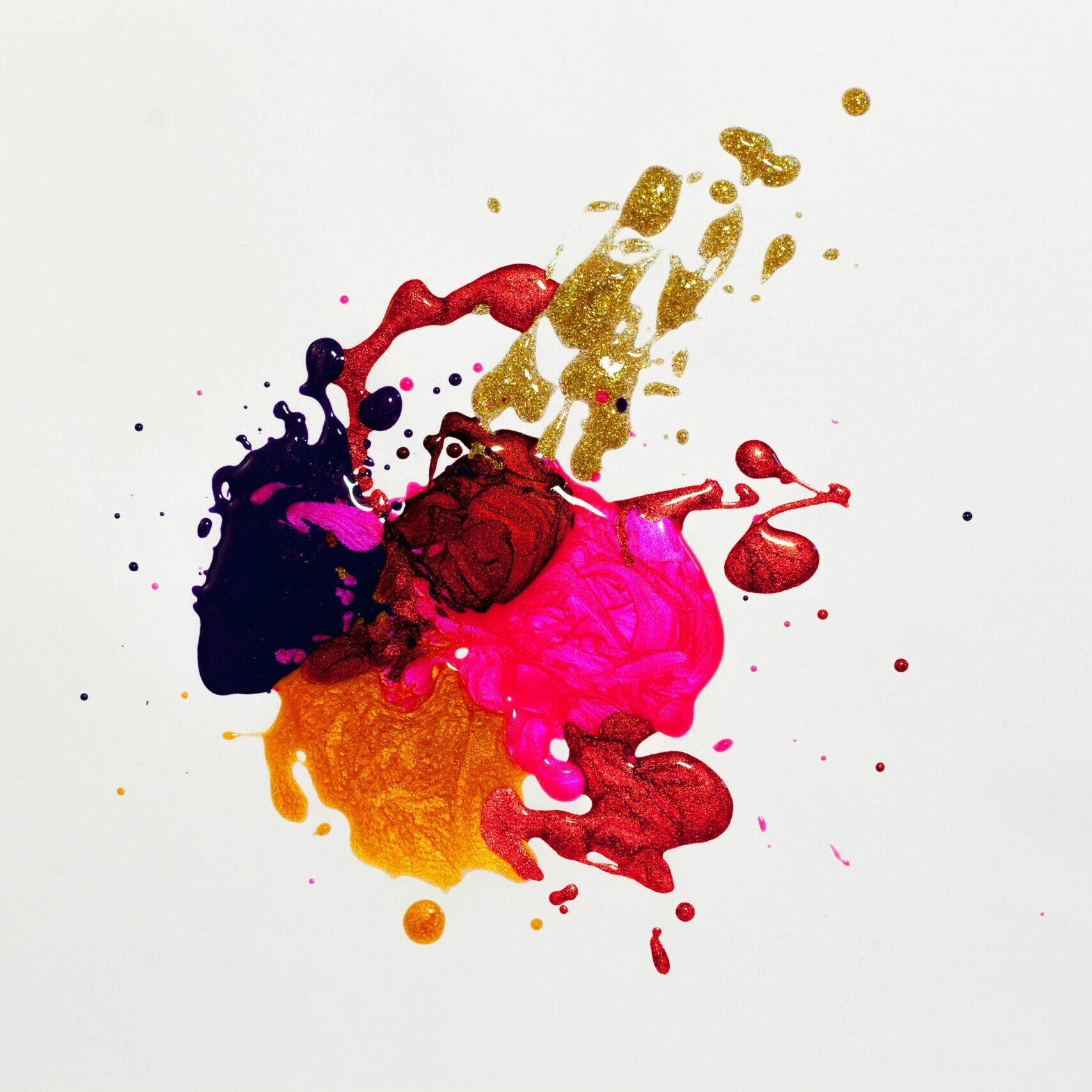 Colorful abstract paint splash on white background, capturing creative expression.